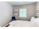 Cozy bedroom with white bedding, plush pillows, and elegant wall art at 745 S Utica St, Denver, CO 80219