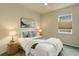 Bright bedroom featuring soft colors, carpeted floors, and a window with light-blocking shades at 8255 E 150Th Pl, Thornton, CO 80602