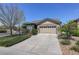 Charming single-Gathering home featuring a well-maintained lawn, and a two-car garage in a suburban neighborhood at 8255 E 150Th Pl, Thornton, CO 80602