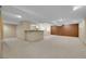 Large finished basement with recessed lighting and wet bar; perfect for entertaining at 10116 Quivas St, Thornton, CO 80260