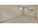 Cozy bedroom with mirrored closet doors and a window providing natural light at 10116 Quivas St, Thornton, CO 80260
