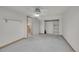 Bedroom featuring a ceiling fan, closet, and a nearby staircase at 10116 Quivas St, Thornton, CO 80260