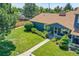 Aerial view of the property showcasing a spacious yard, well-manicured landscaping, and inviting curb appeal at 10116 Quivas St, Thornton, CO 80260