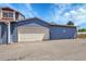 Exterior view showcasing the two-car garage and driveway of this beautiful home at 10116 Quivas St, Thornton, CO 80260