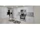 Well-equipped kitchen with stainless steel appliances, ample cabinet space, and modern finishes at 10116 Quivas St, Thornton, CO 80260