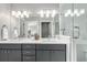 Contemporary bathroom features dual sinks, a walk-in shower, and modern fixtures at 4922 Lowell Blvd # 2, Denver, CO 80221