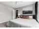 Bedroom features a comfortable bed, art work, and a ceiling fan at 4922 Lowell Blvd # 2, Denver, CO 80221