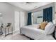 Bedroom with a window, carpeted floors, and a closet with sliding doors at 4922 Lowell Blvd # 2, Denver, CO 80221