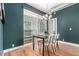 Elegant dining area with modern furniture, an outdoor view, stylish chandelier, and trendy decor at 4922 Lowell Blvd # 2, Denver, CO 80221