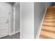 Entryway with wood stairs and gray tiled floors at 4922 Lowell Blvd # 2, Denver, CO 80221