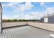 Spacious rooftop deck with wood-like flooring and scenic views, perfect for outdoor entertaining at 4922 Lowell Blvd # 2, Denver, CO 80221