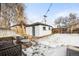 Spacious backyard with detached garage and patio area at 2610 Poplar St, Denver, CO 80207
