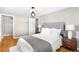 Bright bedroom with double bed, nightstands, and ample closet space at 2610 Poplar St, Denver, CO 80207