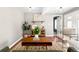 Cozy living room boasts wood floors, a modern chair, and stylish furnishings at 2610 Poplar St, Denver, CO 80207