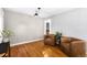 Cozy living room area with hardwood floors and lots of natural light at 2610 Poplar St, Denver, CO 80207