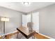 Home office features hardwood floors, a desk, and ample natural light at 2610 Poplar St, Denver, CO 80207