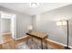 Home office with hardwood floors and modern desk setup at 2610 Poplar St, Denver, CO 80207