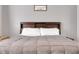 Cozy bedroom with gray walls, a queen-sized bed, and decor create a peaceful and welcoming atmosphere at 20630 E Ithaca Pl, Aurora, CO 80013