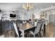 Elegant dining room with a view of the living room and kitchen for easy entertaining at 20630 E Ithaca Pl, Aurora, CO 80013