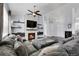 Expansive living room with fireplace, open layout, and lots of natural light at 20630 E Ithaca Pl, Aurora, CO 80013