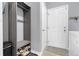 Mud room with coat rack, shelves for shoe storage and gray walls at 20630 E Ithaca Pl, Aurora, CO 80013