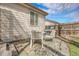 Backyard patio with stone flooring, modern patio furniture, and a grill, perfect for outdoor entertaining at 20630 E Ithaca Pl, Aurora, CO 80013
