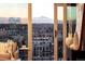 Balcony view with mountain view and contemporary apartment buildings in the distance at 1700 Bassett St # 2117, Denver, CO 80202