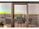 Balcony view featuring city and mountain views and wrought iron railing at 1700 Bassett St # 2117, Denver, CO 80202