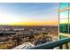 Balcony view features city skyline at sunset from a high-rise condo in the city at 1700 Bassett St # 2117, Denver, CO 80202