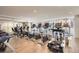 Well-equipped gym with multiple cardio machines, treadmills, and stationary bikes for resident use at 1700 Bassett St # 2117, Denver, CO 80202
