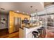 Modern kitchen with sleek countertops, stainless steel appliances, and a breakfast bar at 1700 Bassett St # 2117, Denver, CO 80202