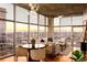 Modern living and dining area boasting city views, lots of sunlight and stylish decor at 1700 Bassett St # 2117, Denver, CO 80202