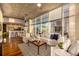 Modern living room with stylish decor, hardwood floors, and open floor plan to kitchen at 1700 Bassett St # 2117, Denver, CO 80202