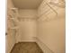 Spacious walk-in closet with wire shelving, providing ample storage space at 1700 Bassett St # 2117, Denver, CO 80202