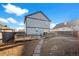 Expansive backyard with a spacious deck, ideal for outdoor entertaining at 55429 E 31St Ave, Strasburg, CO 80136