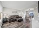 Comfortable living room flowing into a dining area, creating a warm and inviting space at 55429 E 31St Ave, Strasburg, CO 80136