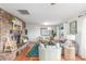 Comfortable living room with a stone fireplace and bright natural light at 5761 W 50Th Ave, Denver, CO 80212