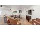 Inviting living room with comfortable seating, mounted speakers and modern decor at 5761 W 50Th Ave, Denver, CO 80212