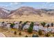 Aerial view of neighborhood showing mountain views and beautiful homes at 8 Mountain High Ct, Littleton, CO 80127