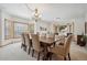 Formal dining room with carpet, neutral paint, and chandelier at 8 Mountain High Ct, Littleton, CO 80127