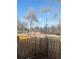 The backyard has a wood fence with views of the local park at 11644 Community Center Dr # 126, Northglenn, CO 80233