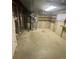 Unfinished basement with utilities provides space for storage and future customization; observe the furnace at 11644 Community Center Dr # 126, Northglenn, CO 80233
