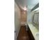 A bathroom with double sinks, updated fixtures, and a tub with shower at 11644 Community Center Dr # 126, Northglenn, CO 80233