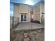 Exterior view of the townhome featuring patio with sliding glass door at 11644 Community Center Dr # 126, Northglenn, CO 80233