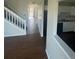 Interior view featuring the stairway, kitchen, and living spaces at 11644 Community Center Dr # 126, Northglenn, CO 80233