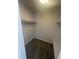 Walk-in closet with carpeted floors and ample shelving for organized storage at 11644 Community Center Dr # 126, Northglenn, CO 80233