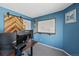Well-lit home office featuring sleek and modern furniture and decor at 10512 Hyacinth St, Highlands Ranch, CO 80129