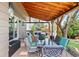 Back patio featuring a dining set and comfortable seating area, ideal for outdoor entertaining at 10512 Hyacinth St, Highlands Ranch, CO 80129