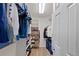 Spacious walk-in closet with built-in shelving and ample storage space for clothes and accessories at 10512 Hyacinth St, Highlands Ranch, CO 80129
