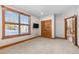 Bedroom with large window, closet, and a view of the stairs at 19 South Rd, Breckenridge, CO 80424
